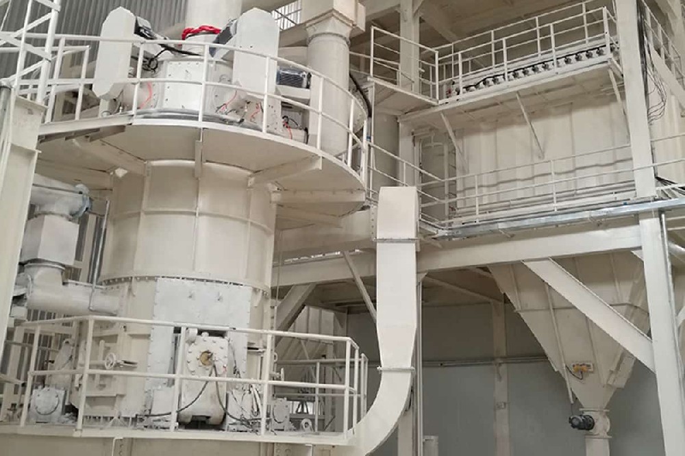 Vertical grinding mills process barite